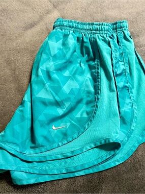 Nike Turquoise Running Shorts with Silver Swoosh